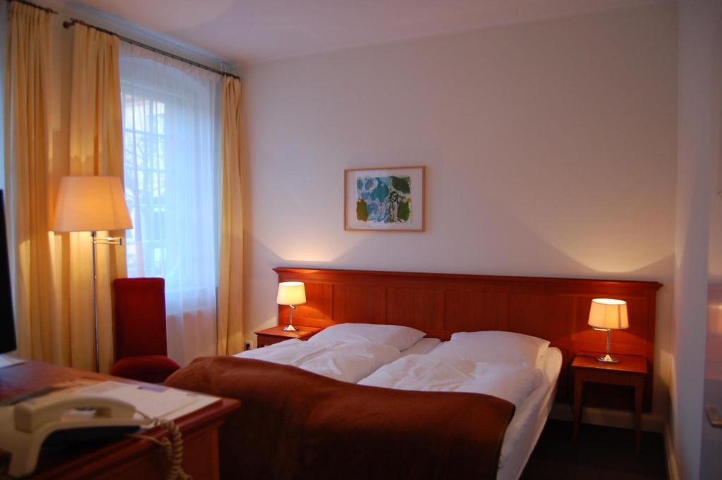 Hotel Vierseithof Лукенвальде Номер фото